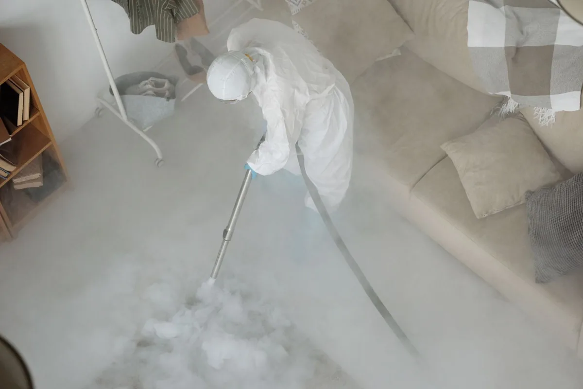 Biohazard cleanup technician in protective equipment, Oceanport, NJ